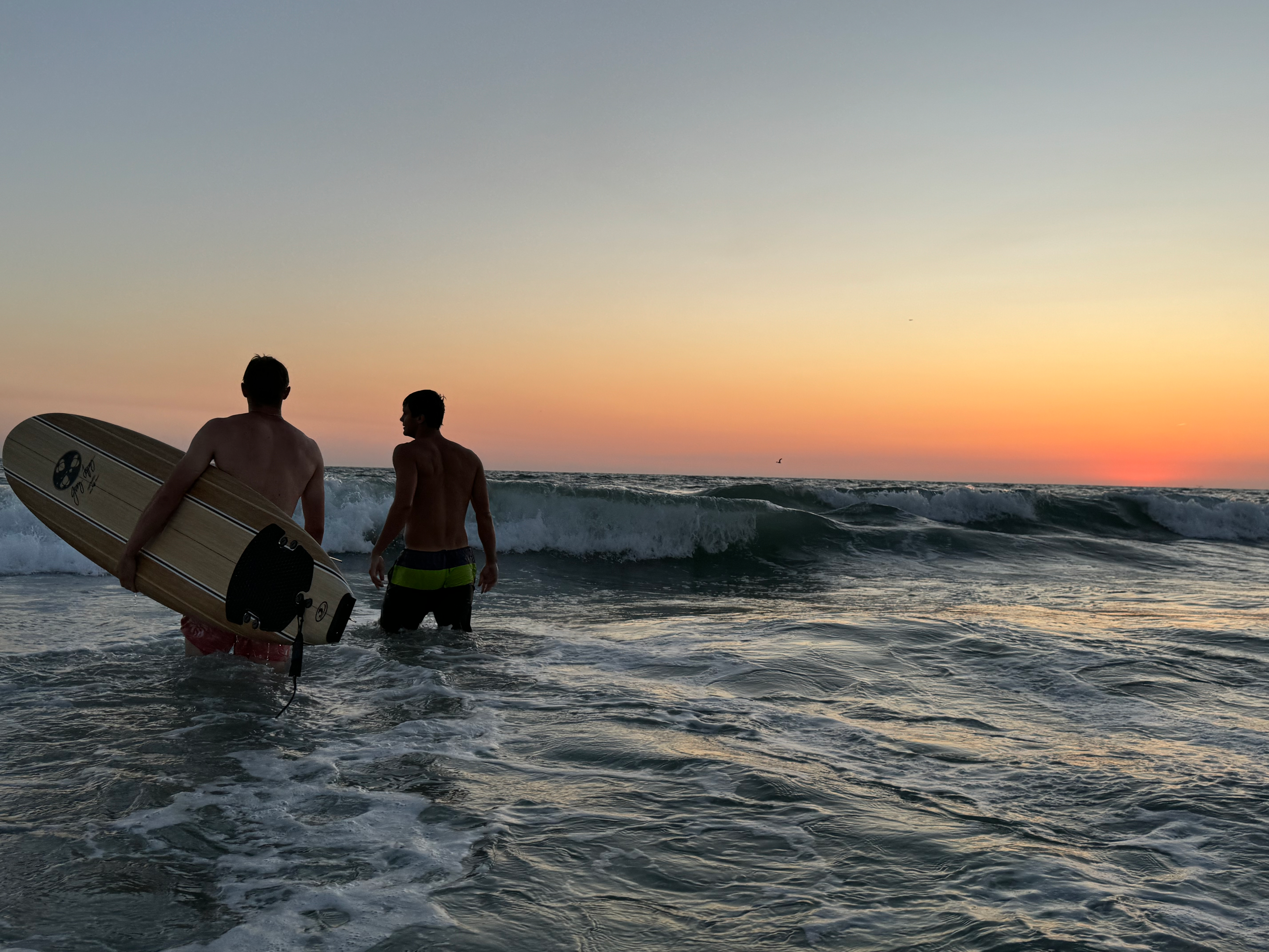 Surfing with Kanaloa Surf Co